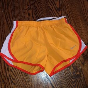 orange nike shorts girls